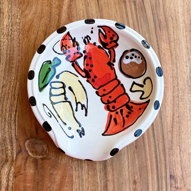 Magnolia Creative Co Crawfish Spoon Rest with dashed black edge