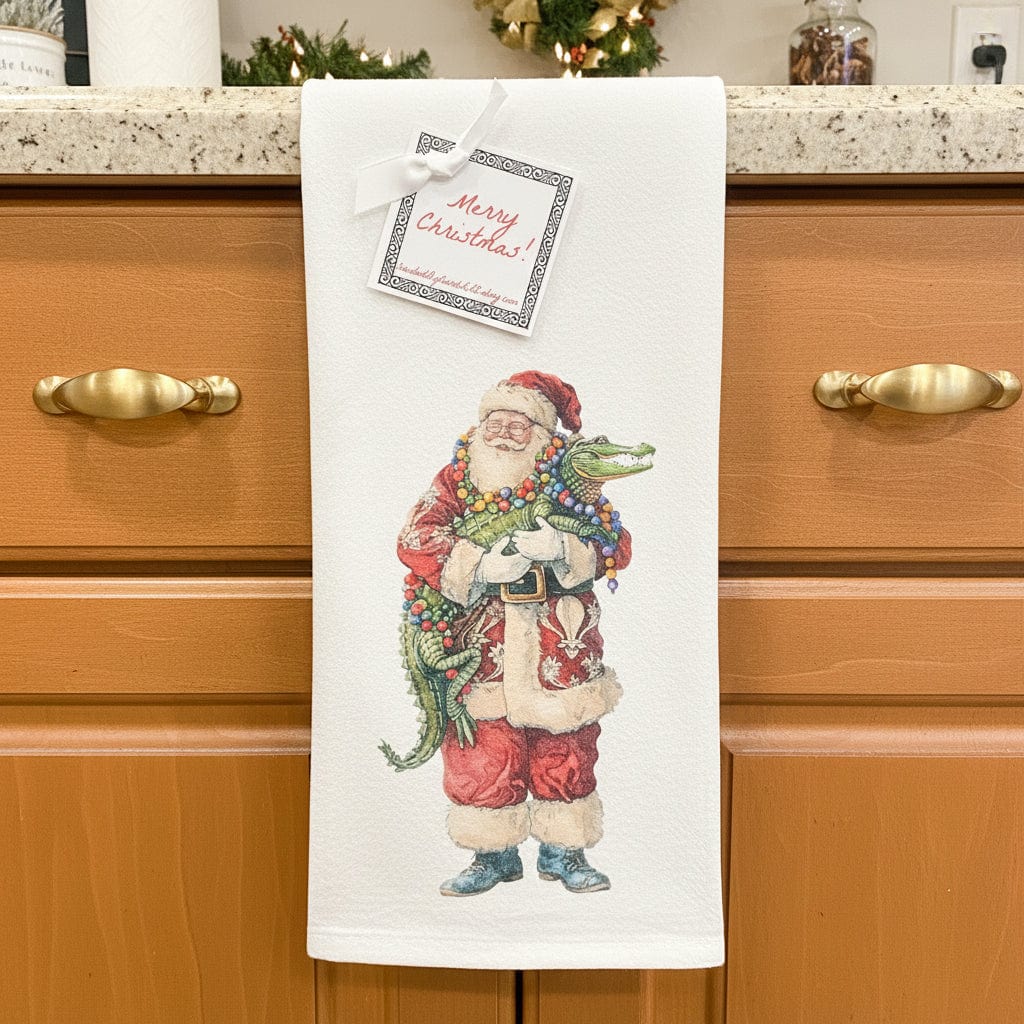 Santa Holding Gator Towel
